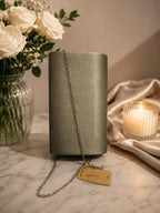 Pochette de soirée gris avec nœud strass